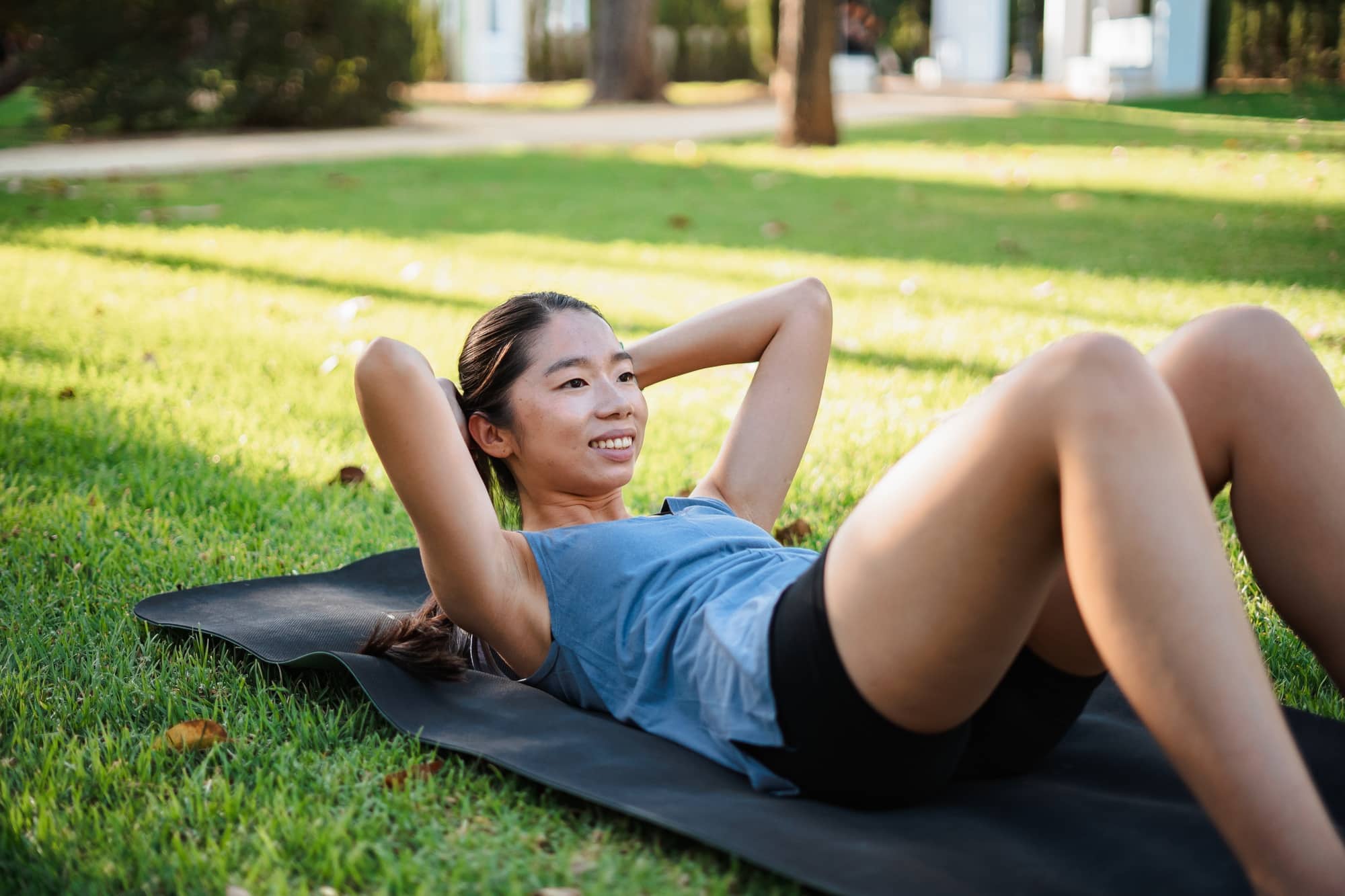 Fitness girl doing abdominal crunches